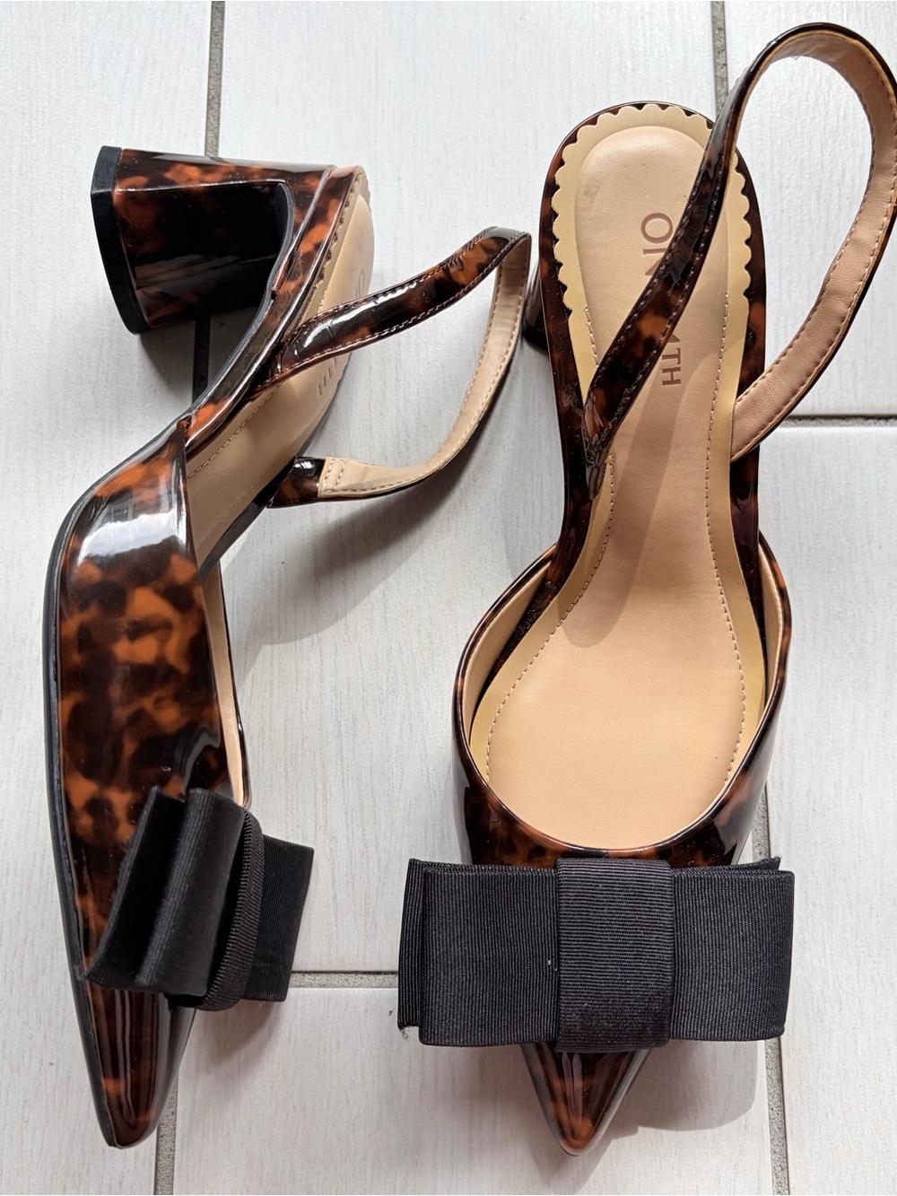 Tortoiseshell Slingback Pointed-Toe Heels with Black Bow